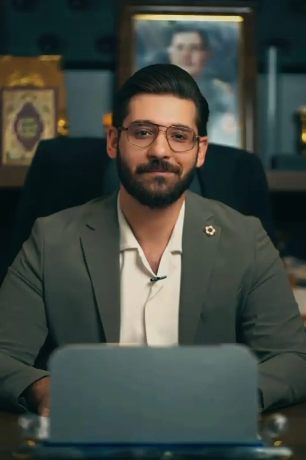 Dr Zaid Al-Omari, Director of Noon Laboratories, is sitting at his office desk.