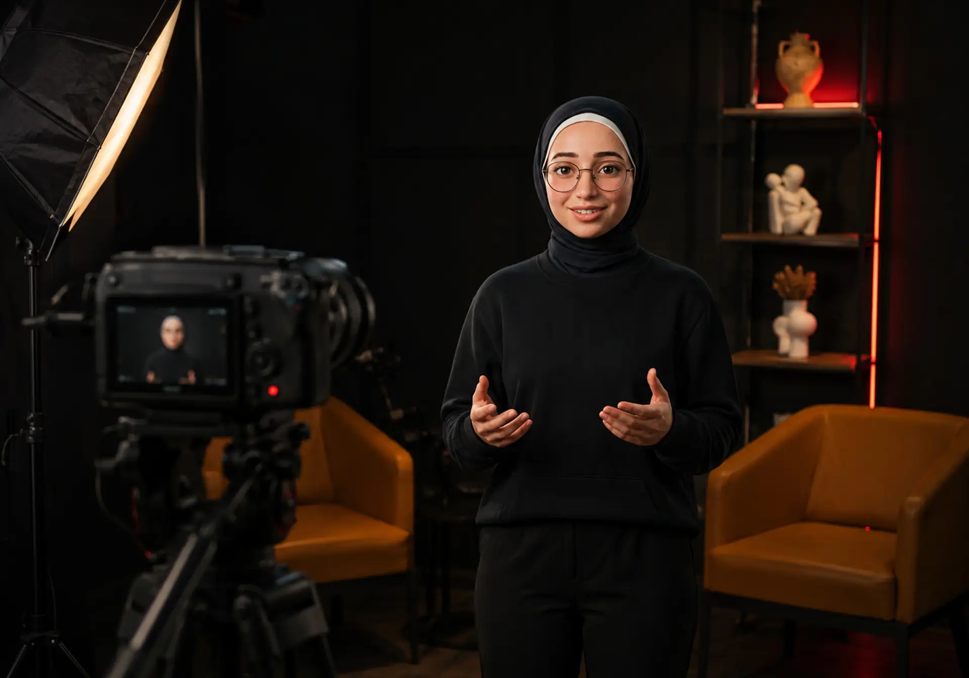 Safaa Alzaro presenting on camera during a video shoot at ONQOL Studio